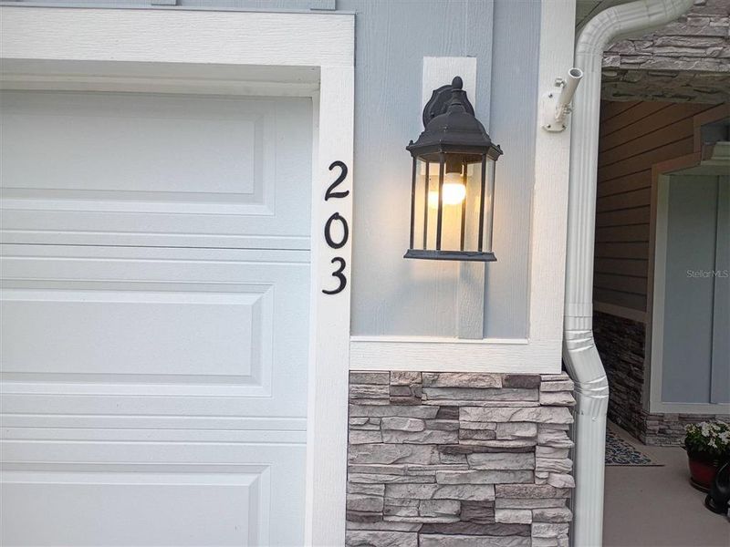 Exterior details and patio area of a home in , Lake City (Image 34).