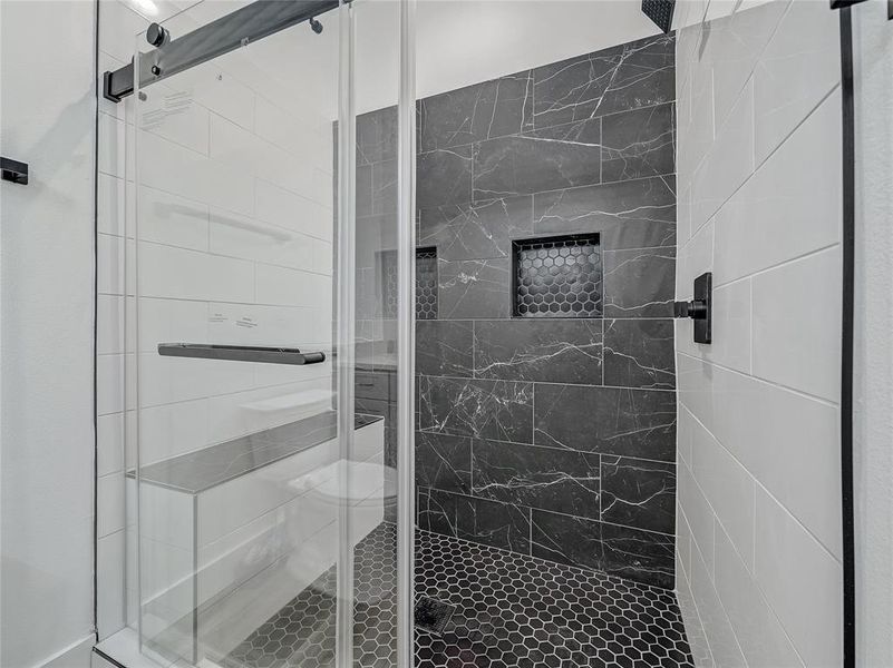 Bathroom with an enclosed shower