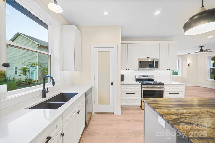 Furnished interior view inside a new home in , Asheville (Image 10).