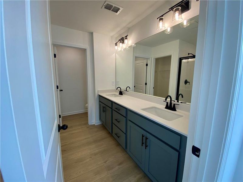 Furnished interior view inside a new home in Eastlyn Crossing, Flowery Branch (Image 10).