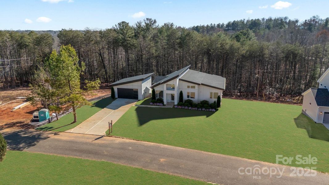 Front exterior of a new home in , Hickory, NC, highlighting curb appeal (Image 2).