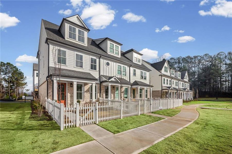 Front exterior of a new home in The Village at River Green, Canton, GA, highlighting curb appeal (Image 21).