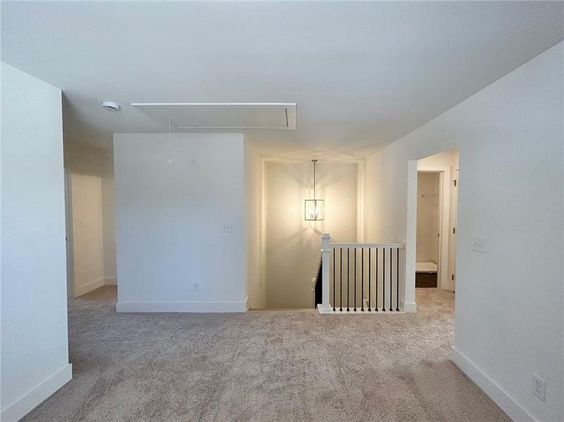 View of carpeted spare room