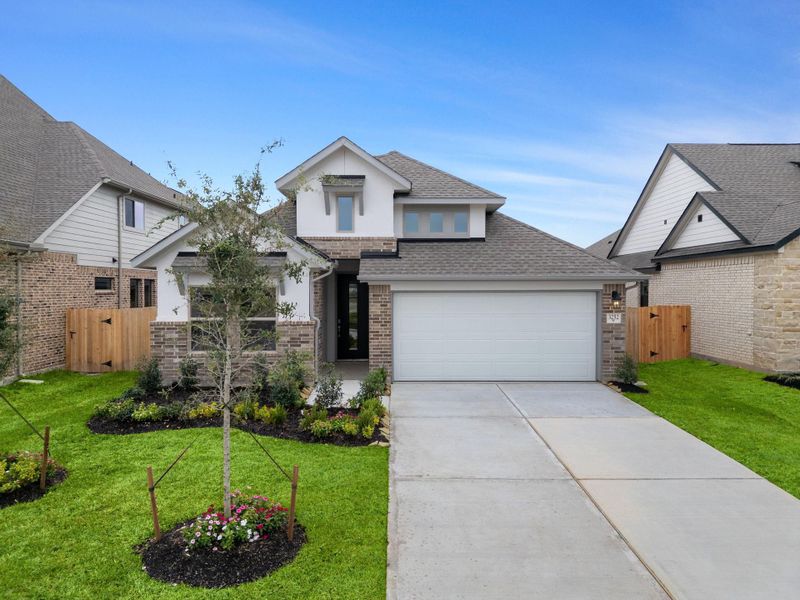Front exterior of a new home in , Spring, TX, highlighting curb appeal (Image 22). Front exterior of a new home in , Spring, TX, highlighting curb appeal (Image 22).