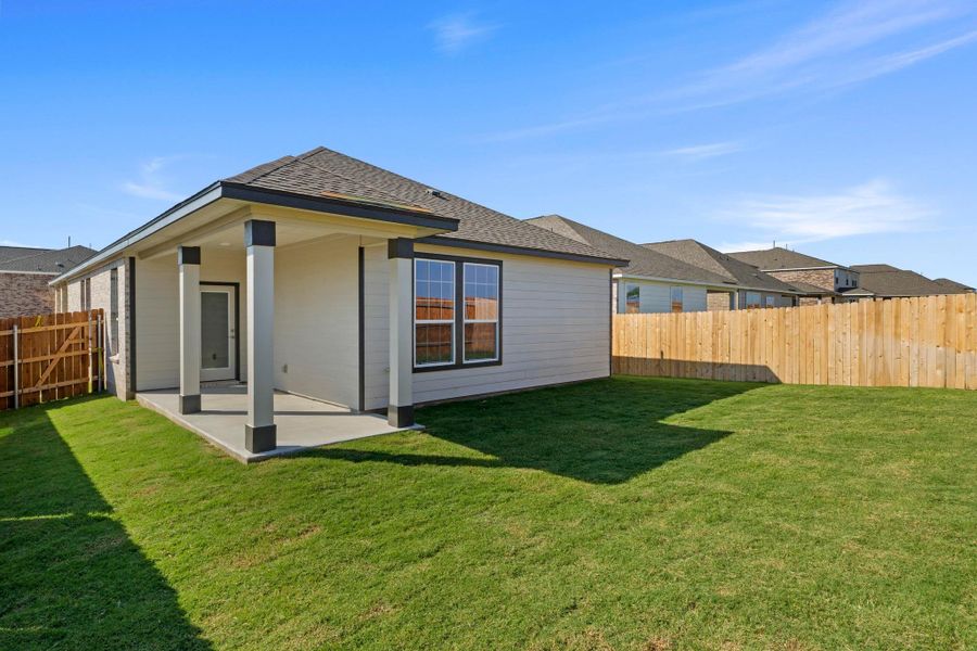 Front exterior of a new home in Salerno - Heritage Collection, Round Rock, TX, highlighting curb appeal (Image 2). Front exterior of a new home in Salerno - Heritage Collection, Round Rock, TX, highlighting curb appeal (Image 2).