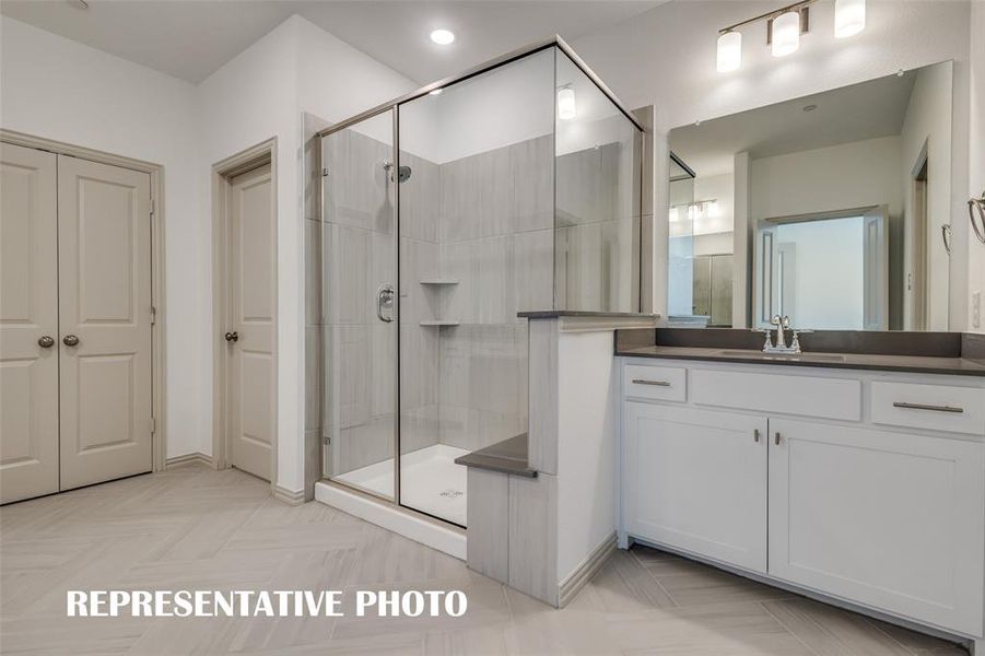 This oversized, walk in shower is the perfect place to start or end your day!  REPRESENTATIVE PHOTO