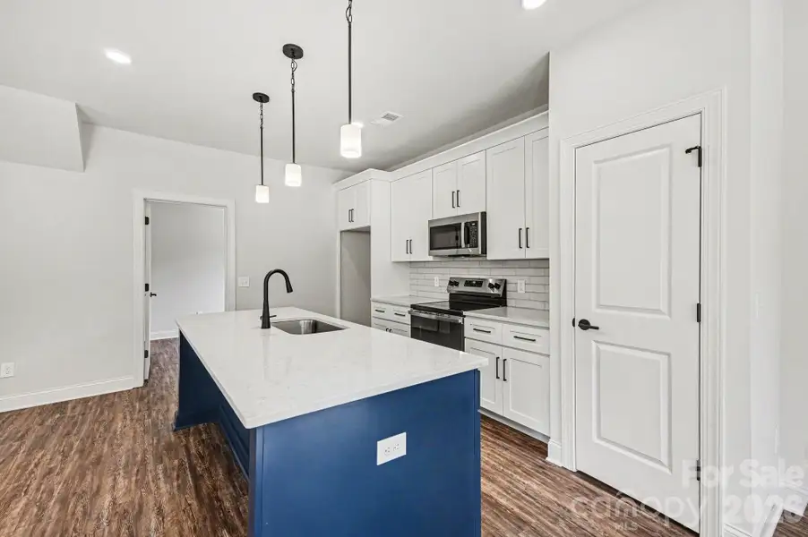 Furnished interior view inside a new home in , Mooresville (Image 6).