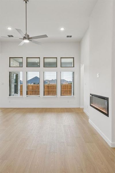 Living Room in the Gilmour II home plan by Trophy Signature Homes – REPRESENTATIVE PHOTO