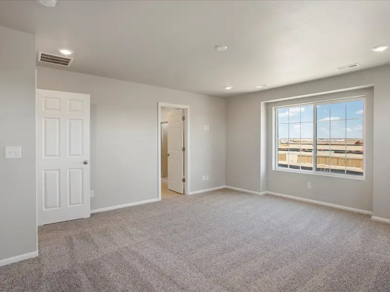 Spacious, unfurnished interior of a new home in Buffalo Highlands: The Flora Collection, Commerce City (Image 16).