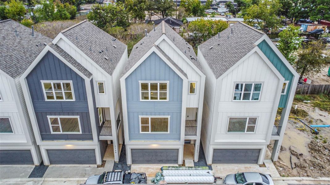 Front exterior of a new home in , Houston, TX, highlighting curb appeal (Image 22).