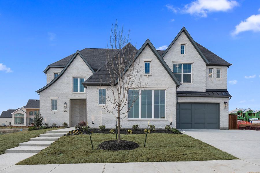 Front exterior of a new home in Park Place - 80' Lots, Prosper, TX, highlighting curb appeal (Image 2). Front exterior of a new home in Park Place - 80' Lots, Prosper, TX, highlighting curb appeal (Image 2).