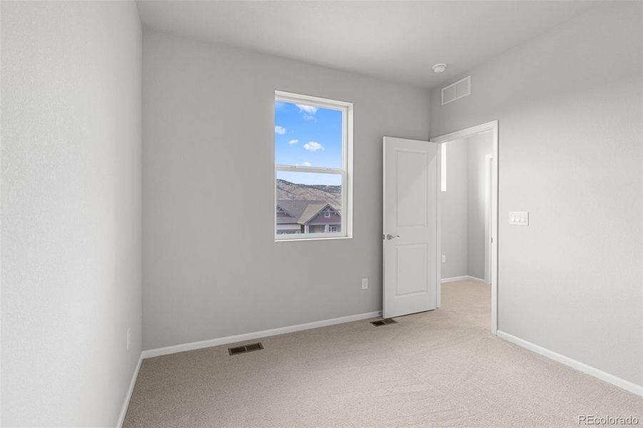 Spacious, unfurnished interior of a new home in The Manors Collection at Golden Overlook, Golden (Image 22).