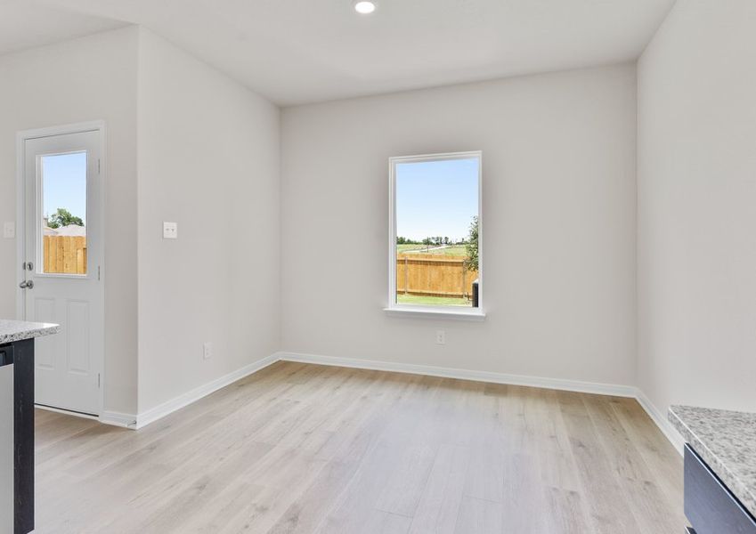 The dining room has a large window that lets in great, natural light and backyard views. The dining room has a large window that lets in great, natural light and backyard views.