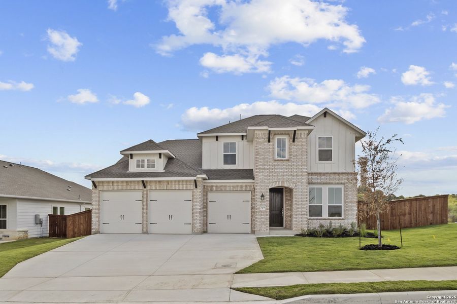 Front exterior of a new home in Homestead, Schertz, TX, highlighting curb appeal (Image 1).