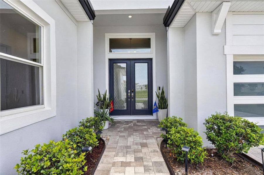 Exterior details and patio area of a home in Robin's Cove at Epperson, Wesley Chapel (Image 31).