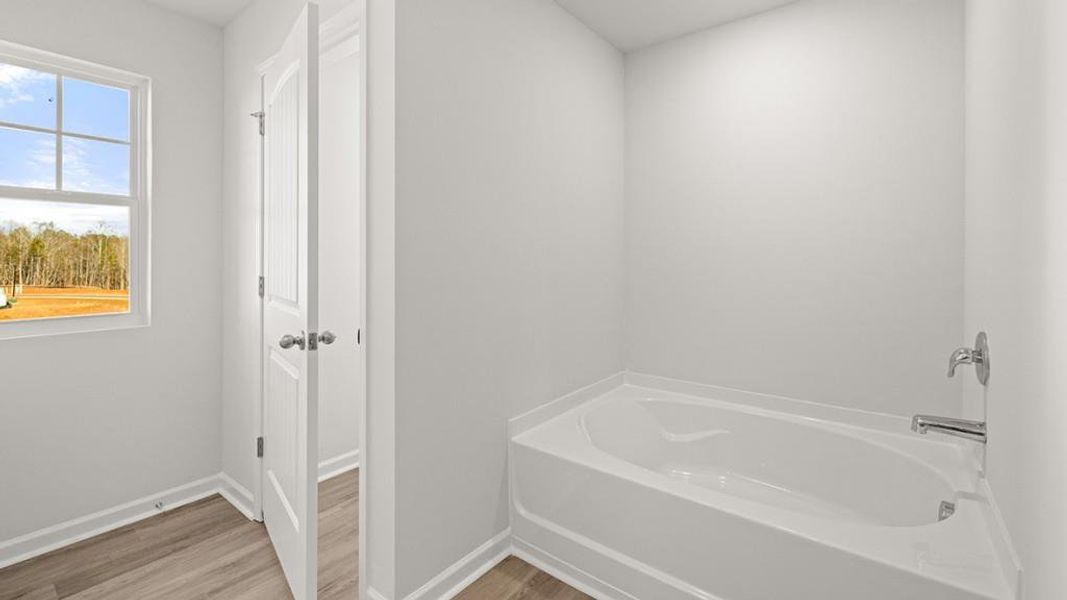 Spacious, unfurnished interior of a new home in Oconee Overlook Townhomes, Gainesville (Image 29).