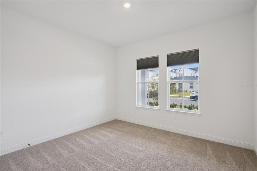 Spacious, unfurnished interior of a new home in Laureate Park, Orlando (Image 21).