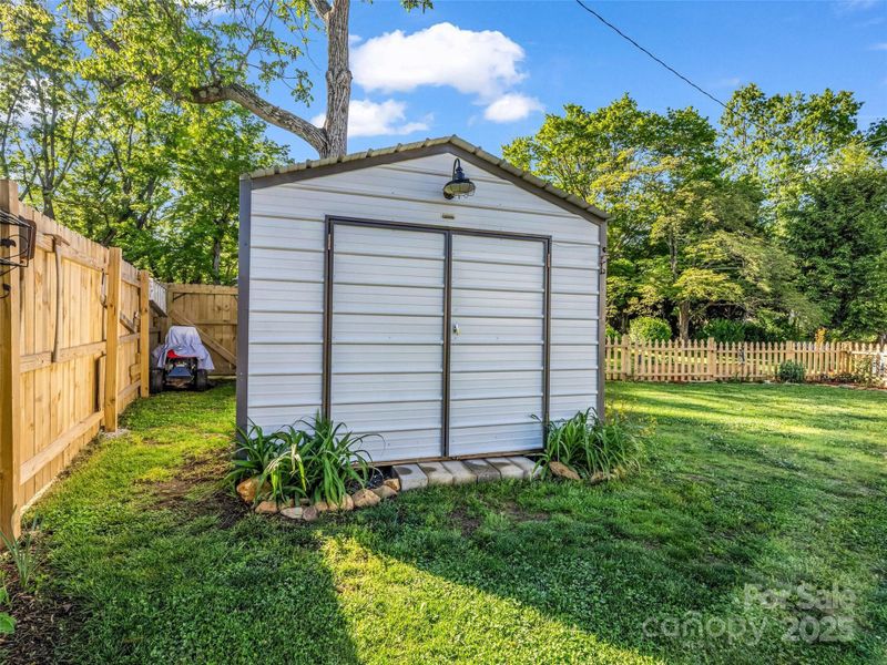 Exterior details and patio area of a home in , Black Mountain (Image 22).
