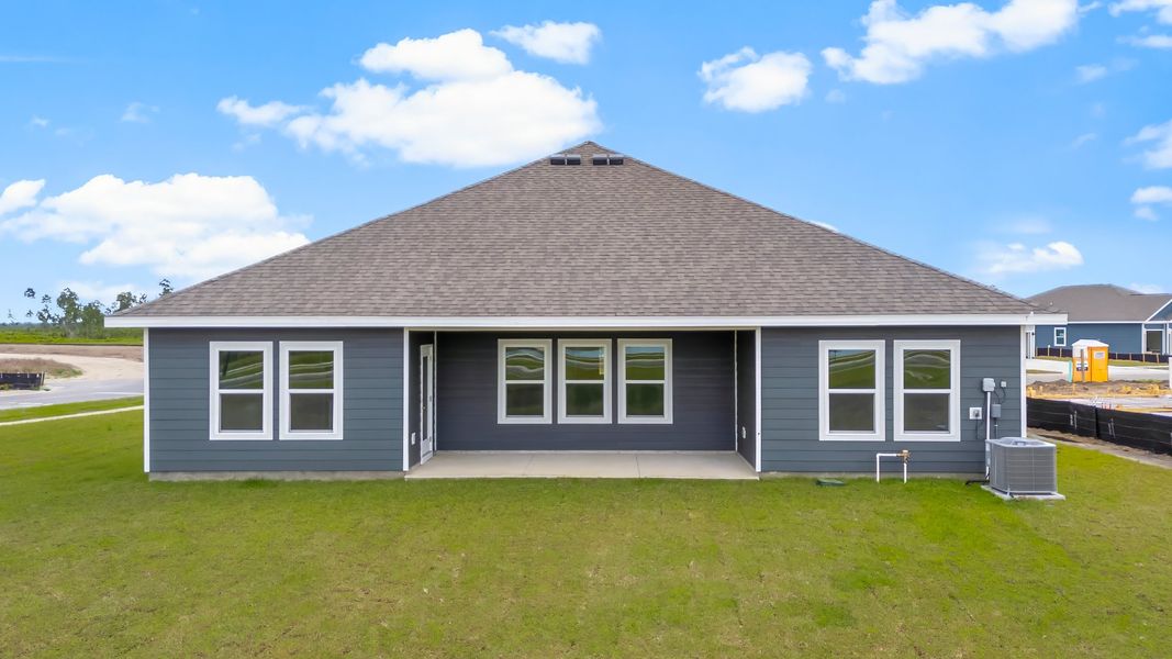Representative exterior photo of a completed home built from the The Victoria by D.R. Horton in Liberty, Panama City, FL (Image 31).