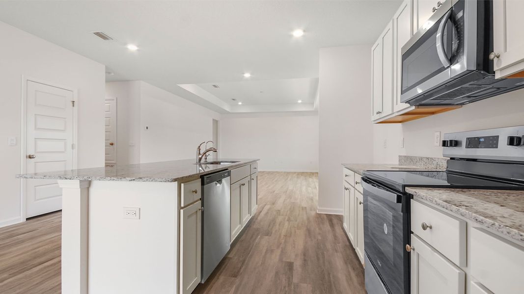 Furnished interior view inside a new home in Owl's Head East, Freeport (Image 6).