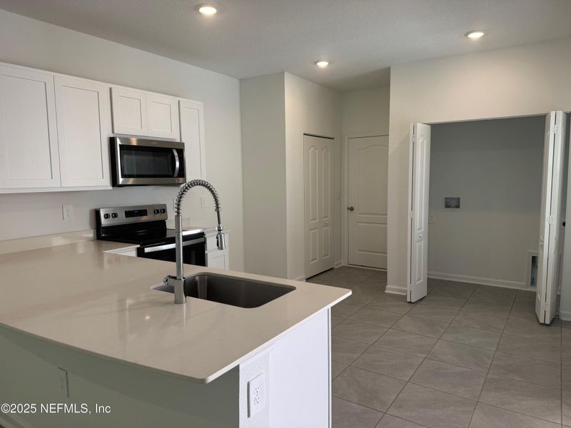 Furnished interior view inside a new home in Bridgewater, St. Augustine (Image 6).