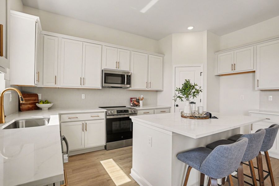 Representative furnished interior of a home built from the Sedona - Waterway by Ashton Woods in Blue Heron Retreat, Little River (Image 7).