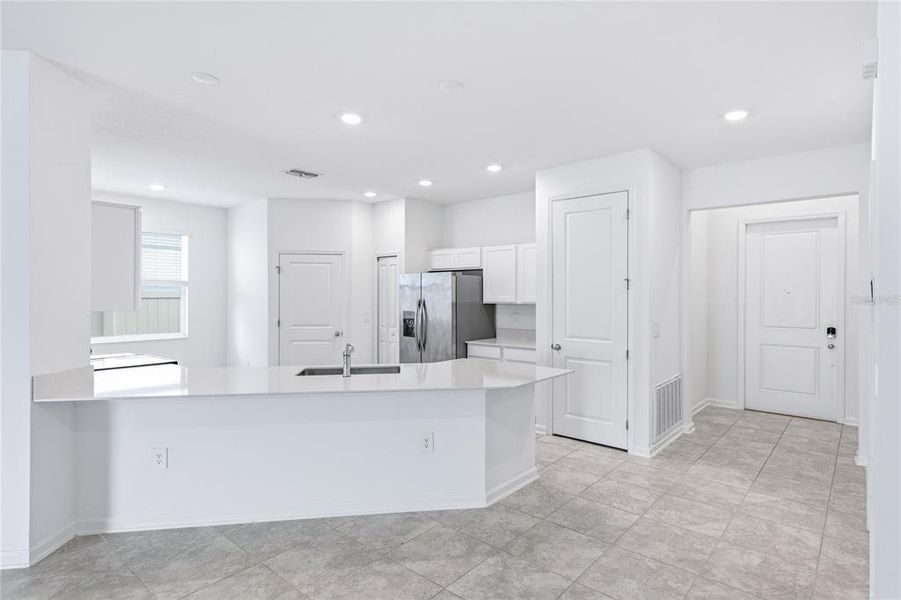 Furnished interior view inside a new home in Peace Creek Reserve, Winter Haven (Image 10).