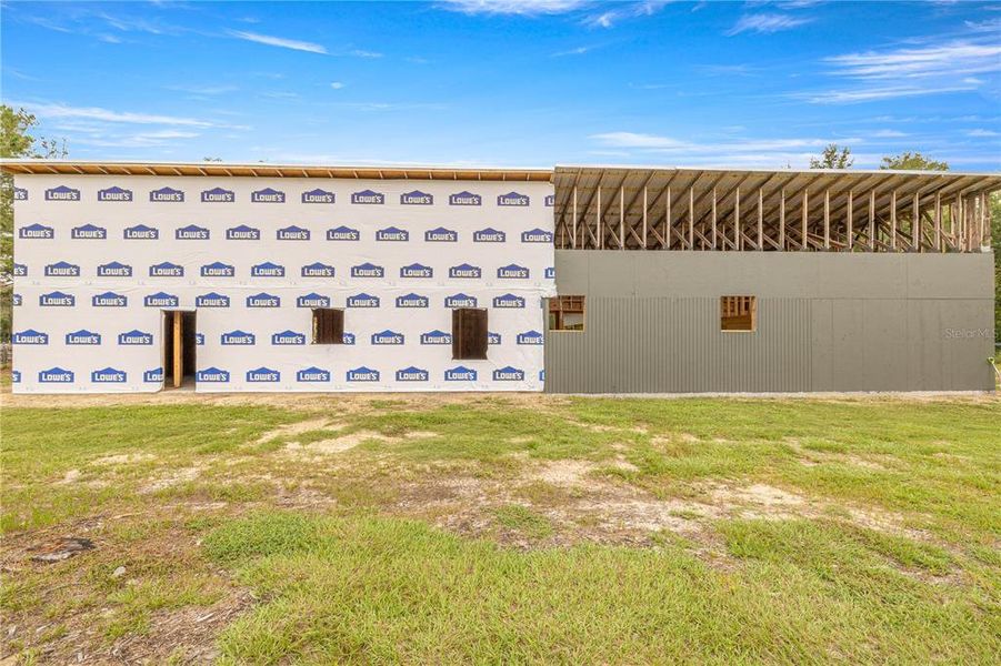 Front exterior of a new home in , Ocala, FL, highlighting curb appeal (Image 1). Front exterior of a new home in , Ocala, FL, highlighting curb appeal (Image 1).