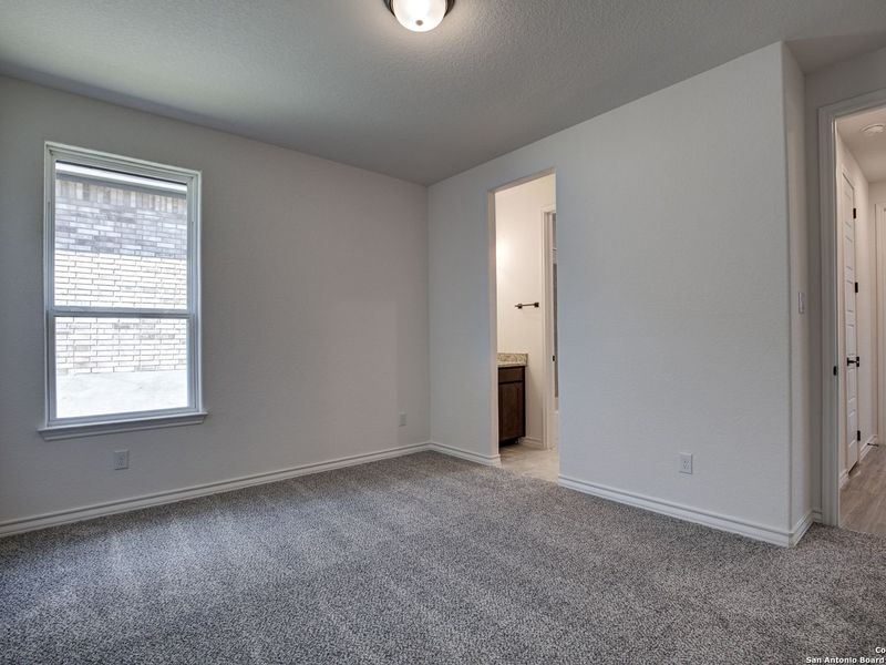 Spacious, unfurnished interior of a new home in The Reserve at Potranco Oaks, Castroville (Image 44).