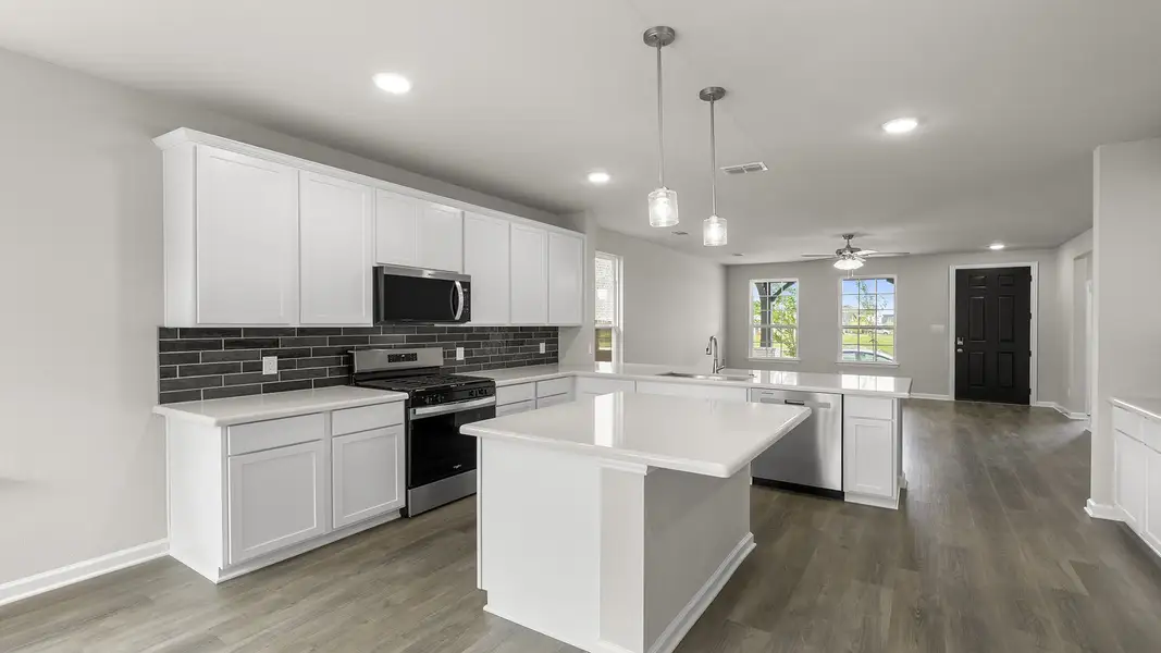 Furnished interior view inside a new home in Waterscape, Royse City (Image 8).
