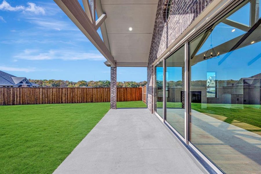 Exterior details and patio area of a home in Kreymer at the Park, Wylie (Image 3). Exterior details and patio area of a home in Kreymer at the Park, Wylie (Image 3).