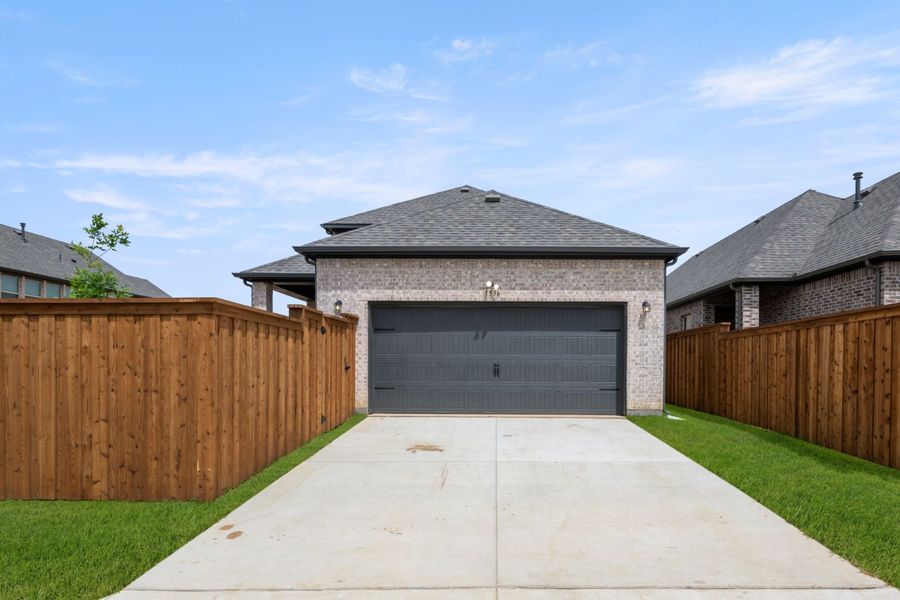 Front exterior of a new home in Walton Ridge, Corinth, TX, highlighting curb appeal (Image 19). Front exterior of a new home in Walton Ridge, Corinth, TX, highlighting curb appeal (Image 19).