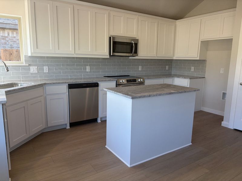 Furnished interior view inside a new home in Craftsman's Corner, Cleburne (Image 4).