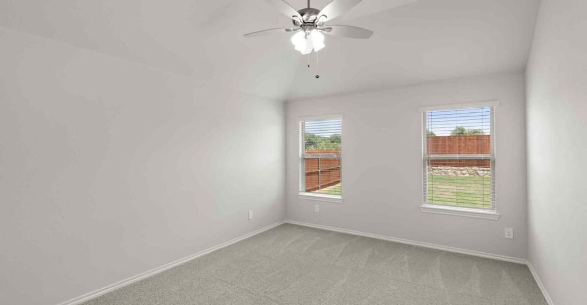 Representative exterior photo of a completed home built from the Atlanta by Impression Homes in Keeneland, Aubrey, TX (Image 13).