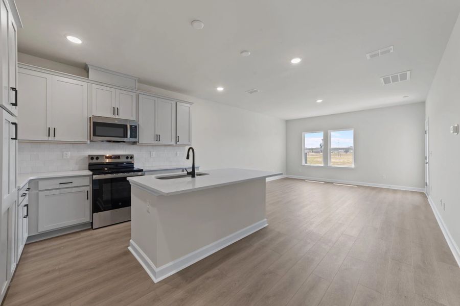 Furnished interior view inside a new home in Blue Heron Retreat, Little River (Image 6).