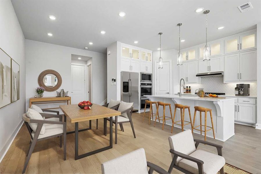 Furnished interior view inside a new home in Walsh: Townhomes - The Patios, Aledo (Image 8). Furnished interior view inside a new home in Walsh: Townhomes - The Patios, Aledo (Image 8).