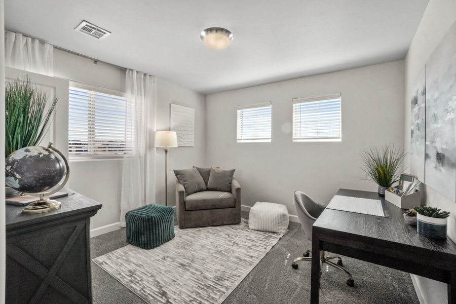 Representative furnished interior of a home built from the Capitan by Hakes Brothers in Hillside Park, El Paso (Image 32).
