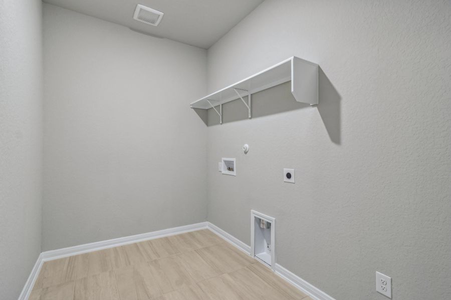 Laundry room in the Allen floorplan at a Meritage Homes community. Laundry room in the Allen floorplan at a Meritage Homes community.
