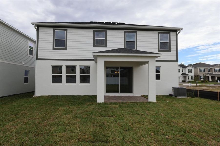Exterior details and patio area of a home in Estates at Rivercrest, Sanford (Image 13). Exterior details and patio area of a home in Estates at Rivercrest, Sanford (Image 13).