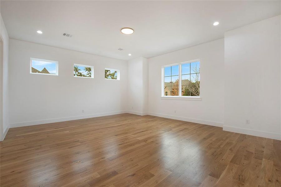 Empty room with wood-type flooring