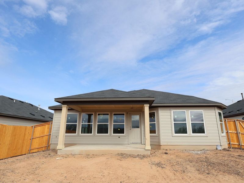 Exterior details and patio area of a home in Carillon, Manor (Image 8).