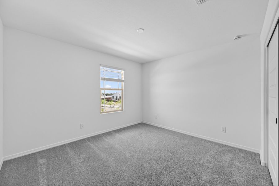 Spacious, unfurnished interior of a new home in Artisan at Asante, Surprise (Image 25).