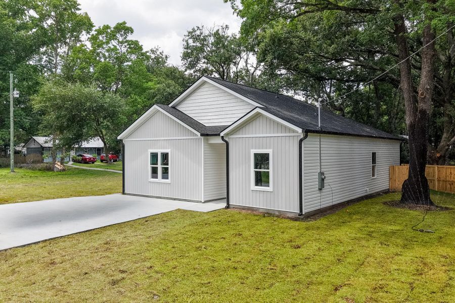 Front exterior of a new home in , North Charleston, SC, highlighting curb appeal (Image 2). Front exterior of a new home in , North Charleston, SC, highlighting curb appeal (Image 2).