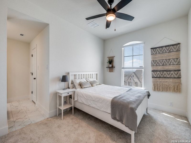 Furnished interior view inside a new home in The Ranches at Creekside, Boerne (Image 16).