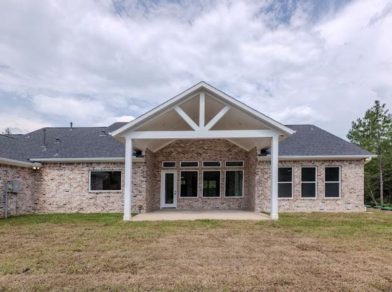 Exterior details and patio area of a home in , Willis (Image 3). Exterior details and patio area of a home in , Willis (Image 3).