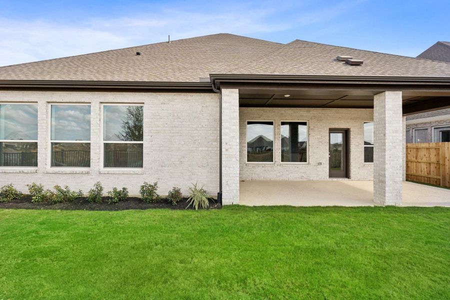 Exterior details and patio area of a home in Oakwood Estates, Waller (Image 25). Exterior details and patio area of a home in Oakwood Estates, Waller (Image 25).