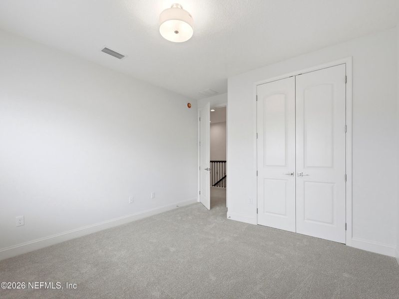 Spacious, unfurnished interior of a new home in Silver Landing At Silverleaf, St. Augustine (Image 58).