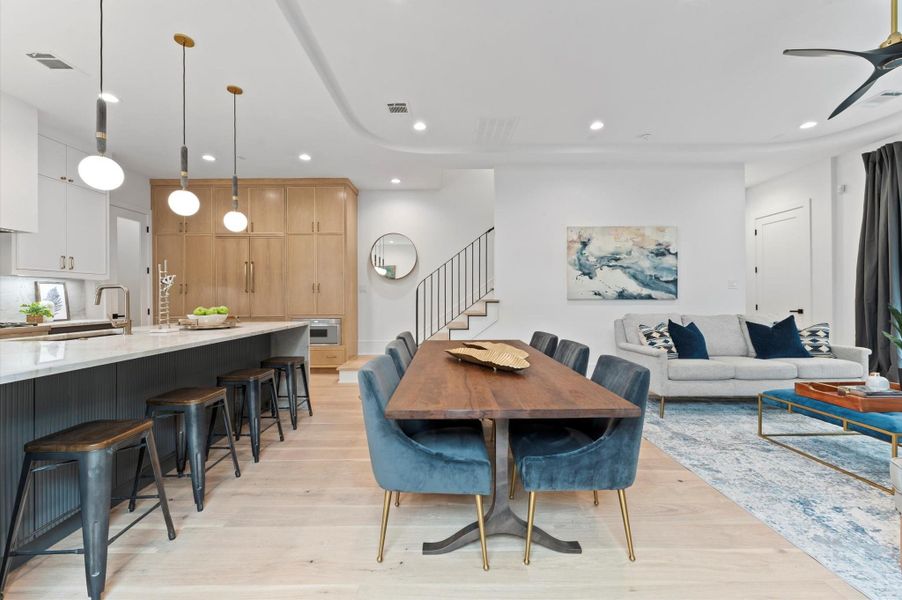 blend with stain white oak and modern white poplar custom cabinets.