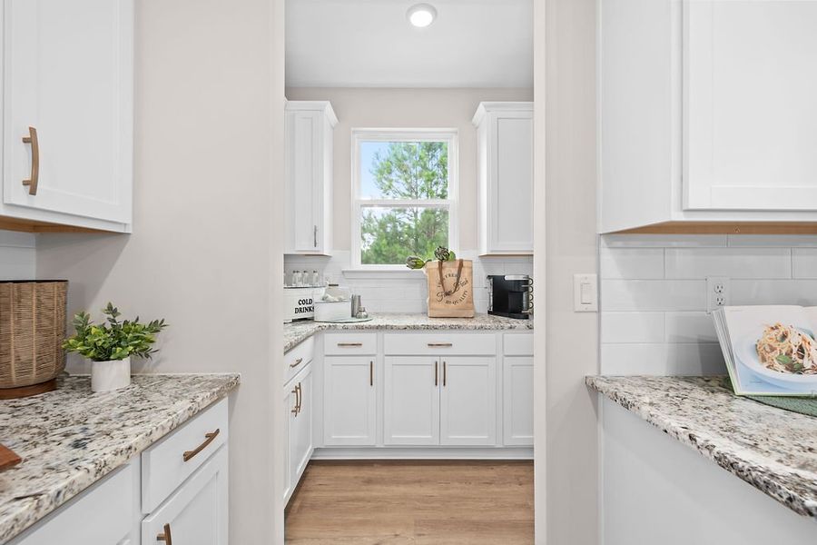Representative furnished interior of a home built from the The Wilmington by Smith Family Homes in Savannah Highlands, Savannah (Image 10).