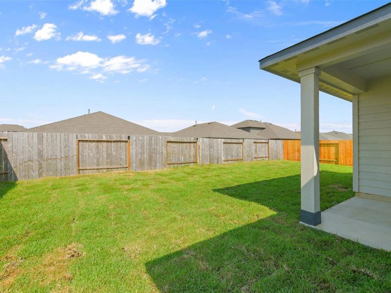 Exterior details and patio area of a home in River Ranch Meadows, Dayton (Image 1).